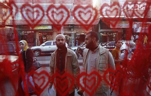 Palestinian Salafists stand outside a shop on the eve of Valentine's day in Rafah in the southern Gaza Strip. Credit: Said Khatib/AFP